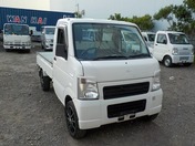 It is a picture of the white suzuki carry truck in 2008,First Photo Stock No.Y031184