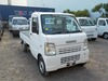 It is a picture of the white suzuki carry truck in 2004,Sub Photo 0 Stock No.Y031188