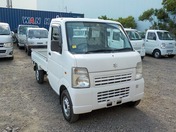It is a picture of the white suzuki carry truck in 2010,First Photo Stock No.Y031197