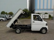 It is a picture of the white mitsubishi minicab dump in 2006,First Photo Stock No.Y031441