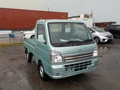 It is a picture of the green suzuki carry truck in 2019,First Photo Stock No.Y031588