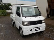 It is a picture of the white mitsubishi minicab truck in 2001,First Photo Stock No.Y031589