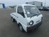 It is a picture of the white suzuki carry truck in 1993,Sub Photo 0 Stock No.Y031675