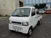 It is a picture of the white suzuki carry truck in 2002,Sub Photo 1 Stock No.Y031963