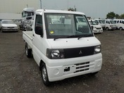 It is a picture of the white mitsubishi minicab truck in 2002,First Photo Stock No.Y031983