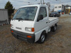 It is a picture of the white suzuki carry truck in 1996,Sub Photo 1 Stock No.Y038110