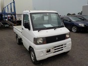 It is a picture of the white mitsubishi minicab truck in 2005,First Photo Stock No.Y032410