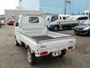 It is a picture of the white suzuki carry truck in 2002,Sub Photo 3 Stock No.Y032461