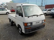 It is a picture of the white daihatsu hijet truck in 1998,First Photo Stock No.Y032463