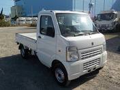 It is a picture of the white suzuki carry  truck in 2010,First Photo Stock No.Y032540