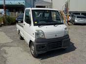 It is a picture of the white mitsubishi minicab truck in 1999,First Photo Stock No.Y032601