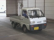 It is a picture of the bronze suzuki carry truck in 1994,First Photo Stock No.Y032604