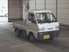 It is a picture of the bronze suzuki carry truck in 1994,Sub Photo 0 Stock No.Y032604
