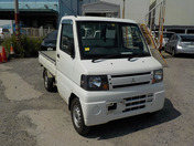 It is a picture of the white mitsubishi minicab truck in 2010,First Photo Stock No.Y032623