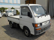 It is a picture of the white daihatsu hijet truck in 1994,First Photo Stock No.Y032636