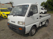 It is a picture of the white suzuki carry truck in 1992,First Photo Stock No.Y032675