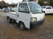 It is a picture of the white honda acty truck in 1996,First Photo Stock No.Y032705