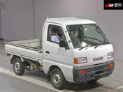 It is a picture of the white suzuki carry truck in 1995,First Photo Stock No.Y032722