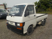 It is a picture of the white daihatsu hijet  truck in 1994,First Photo Stock No.Y032725