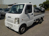 It is a picture of the white suzuki carry truck in 2004,Sub Photo 1 Stock No.Y032762