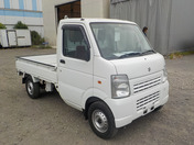It is a picture of the white suzuki carry truck in 2010,First Photo Stock No.Y032772