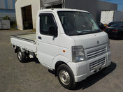 It is a picture of the white suzuki carry truck in 2010,First Photo Stock No.Y033002