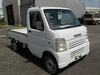 It is a picture of the white suzuki carry truck in 2002,Sub Photo 0 Stock No.Y033010