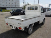 It is a picture of the white suzuki carry truck in 2002,Sub Photo 2 Stock No.Y033010