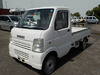 It is a picture of the white suzuki carry truck in 2002,Sub Photo 1 Stock No.Y033010