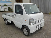 It is a picture of the white suzuki carry truck in 2010,First Photo Stock No.Y033104