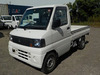 It is a picture of the white mitsubishi minicab truck in 2003,Sub Photo 1 Stock No.Y033165