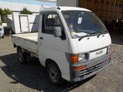 It is a picture of the white daihatsu hijet  truck in 1995,First Photo Stock No.Y033212