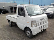 It is a picture of the white suzuki carry truck in 2008,First Photo Stock No.Y033254