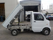 It is a picture of the white suzuki carry dump in 2003,First Photo Stock No.Y033290