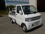 It is a picture of the white mitsubishi minicab truck in 2011,First Photo Stock No.Y033496