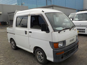 It is a picture of the white daihatsu hijet deck van in 1997,First Photo Stock No.Y033519