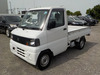 It is a picture of the white mitsubishi minicab  truck in 2002,Sub Photo 1 Stock No.Y033664