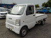 It is a picture of the white suzuki carry truck in 2002,Sub Photo 1 Stock No.Y033710