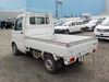 It is a picture of the white suzuki carry truck in 2002,Sub Photo 3 Stock No.Y033710