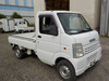 It is a picture of the white suzuki carry truck in 2002,Sub Photo 0 Stock No.Y033710