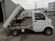 It is a picture of the white suzuki carry dump in 2006,First Photo Stock No.Y033870