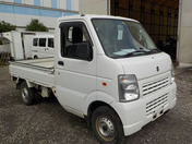 It is a picture of the white suzuki carry truck in 2012,First Photo Stock No.Y033882