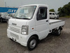 It is a picture of the white suzuki carry truck in 2004,Sub Photo 1 Stock No.Y033933