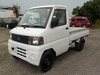It is a picture of the white mitsubishi minicab truck in 2001,Sub Photo 1 Stock No.Y033957