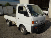It is a picture of the white suzuki carry truck in 1996,First Photo Stock No.Y033971