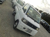 It is a picture of the white mitsubishi minicab truck in 2001,First Photo Stock No.Y034116