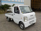 It is a picture of the white suzuki carry truck in 2009,First Photo Stock No.Y034130