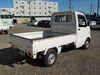 It is a picture of the white suzuki carry truck in 2003,Sub Photo 2 Stock No.Y034315