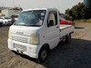 It is a picture of the white suzuki carry truck in 2003,Sub Photo 1 Stock No.Y034315