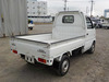 It is a picture of the white suzuki carry truck in 2002,Sub Photo 2 Stock No.Y034317